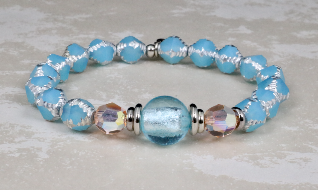Czech glass center on blue bicone