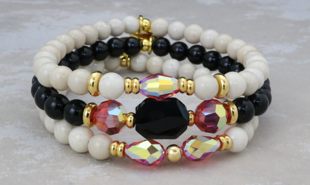 Padparadscha on Riverstone and Onyx
