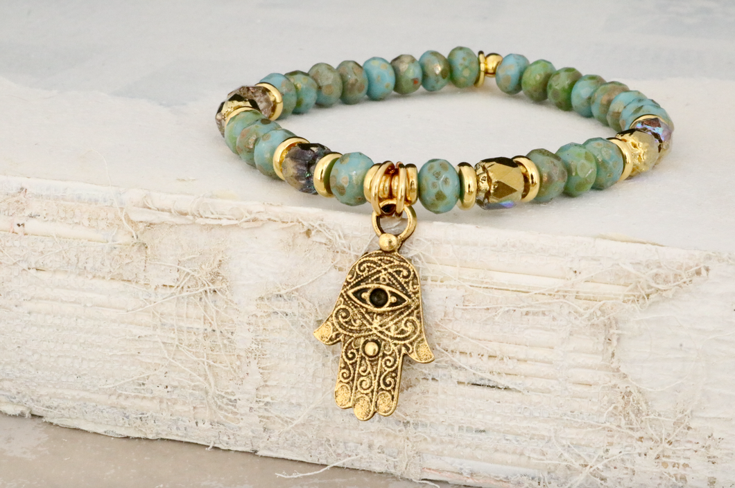 Hamsa on Czech Rondelles