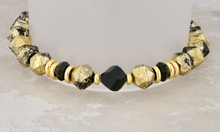Load image into Gallery viewer, Jet Crystals on Gold Etched Beads
