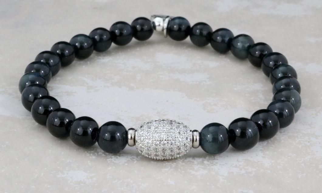 Mini Marley on Black Tiger's Eye